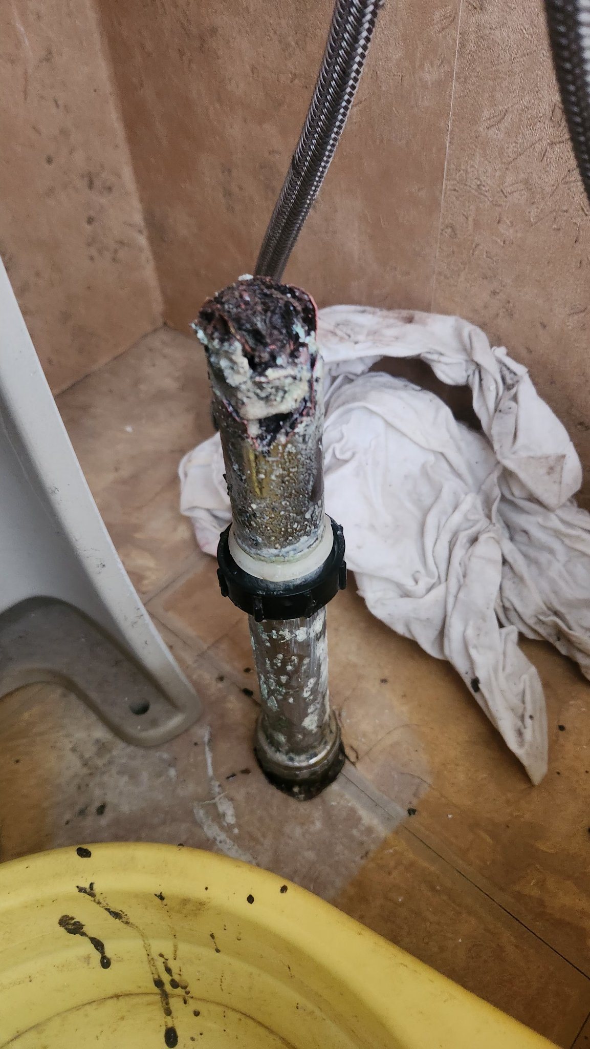 Plumber near Queen's University, Kingston 1 Clogged drain tailpiece removed by Leak Free Plumbing — serving the Queen's University area, Kingston