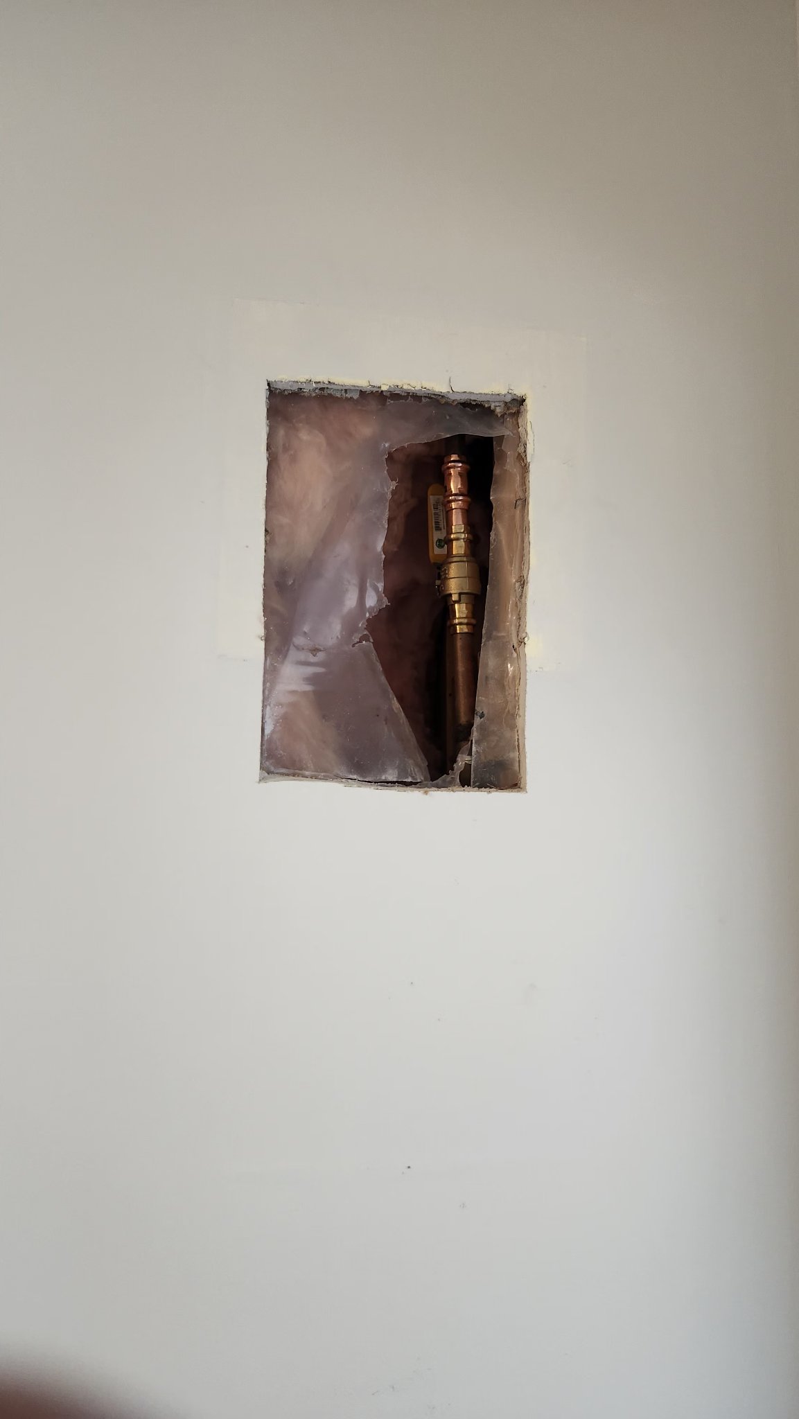 Emergency plumber Kingston - shut-off valve and copper pipe repaired inside a wall
